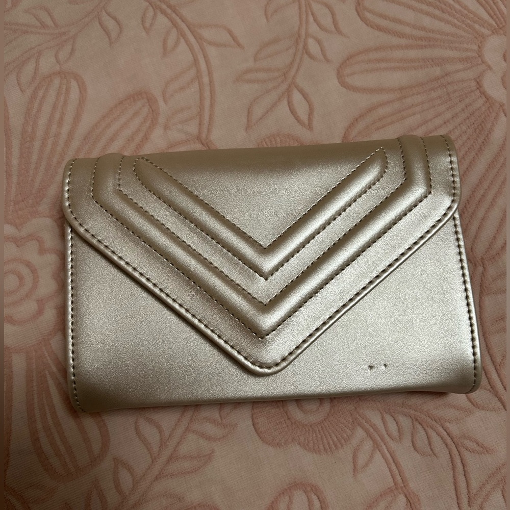 Cream colored clutch perfect for a special occasion!